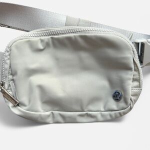 LULULEMON gray belt/crossbody bag.